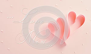 Mother day, Love , Valentine\'s and women\'s day concept made from paper hearts and the text on pastel background