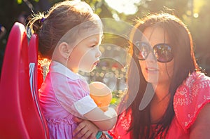 Mother discussing with her daughter