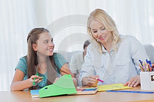 Mother doing arts and crafts with her daughter