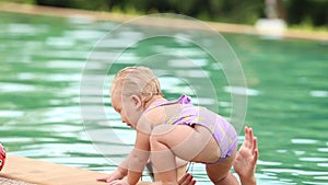 Mother and Douther Swim in the Pool