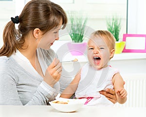 Mother Feeding Her Baby