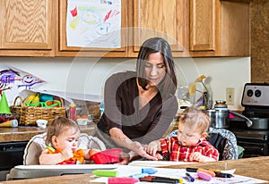 Mother Feeds Babies