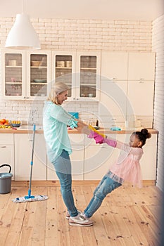 Mother feeling happy spending day off with daughter