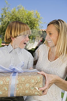 Mother Gifting A Present On Birthday