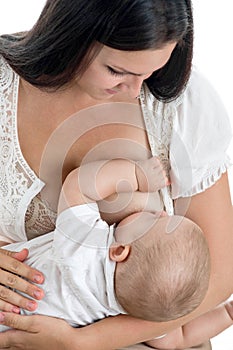 Mother giving breastmilk to her baby