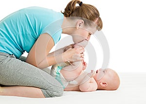 Mother having fun with baby boy infant