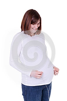 Mother With Headphones on Belly