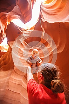 Mother and her baby son visit Lower Antelope canyon in Arizona