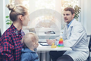 Mother with her child at doctor consultation