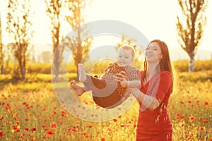 Mother with her child in sunlight