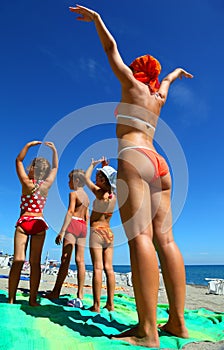 Mother and her children on beach