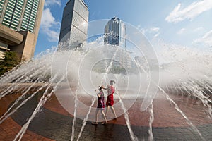 Mother and her daughter are dancing together into photo