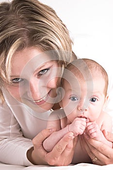 Mother and her sucking baby