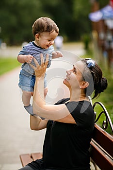 Mother holding little son