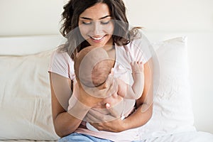 Mother holding newborn baby