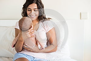 Mother holding newborn baby