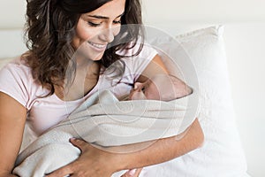 Mother holding newborn baby