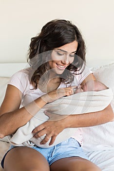 Mother holding newborn baby