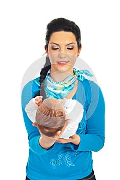 Mother holding newborn baby in her hands