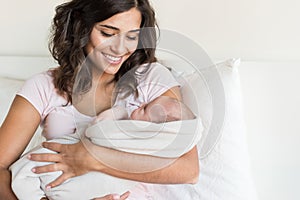 Mother holding newborn baby