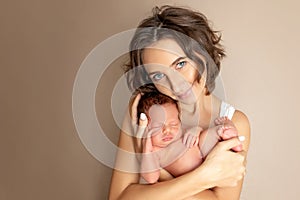 Mother holds a newborn baby, replenishment in the family, discharge from the hospital, happy family, mother`s day