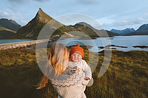 Mother with infant baby traveling in Norway family lifestyle vacations