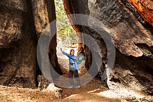 Mother with infant visit Sequoia national park in California, USA