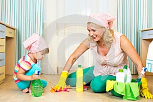 Mother and kid cleaning room