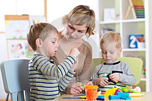 Mother and kids have a fun at home