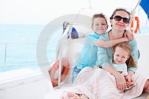 Mother and kids at luxury yacht