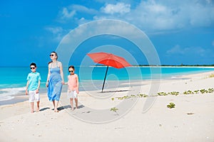 Mother and kids on a tropical beach