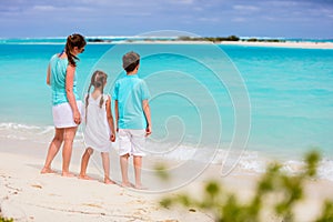 Mother and kids on a tropical beach