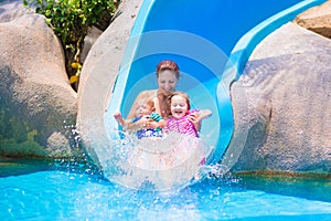 Mother and kids at water slide