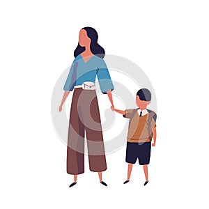 Mother leading her son to school. Portrait of modern family walking together. Parent and little pupil boy holding hands