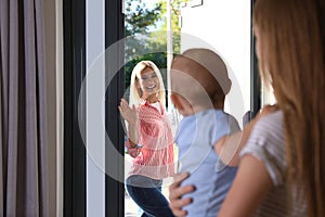 Mother leaving her baby with teen nanny