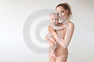 Mother and little boy son closeup portrait, happy faces on background, mom