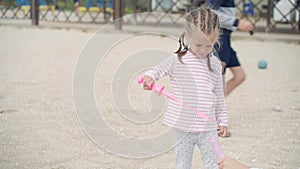Mother With Little Child Blowing Soap Bubbles On Sea Beach Traveling with one Children Family Summer Vacation