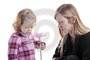 Mother and little girl gardening