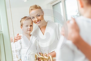 mother and little son in bathroom