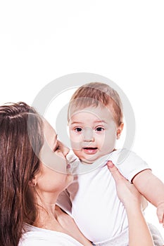 Mother looking at her amazed baby