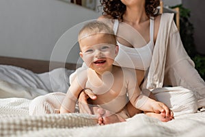 mother in loungewear with crop top