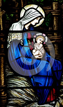 Mother Mary with baby Jesus (Nativity) in stained glass