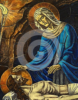 Mother Mary grieving over het dead son Jesus mosaic photo