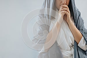 Mother Mary praying