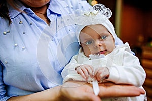 Mother And Newborn Baby with blue eyes Family Portrait, Mom Embracing New Born Kid