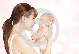 Mother and Newborn Baby, Mom Looking to New Born Child photo