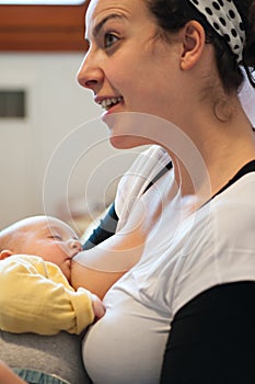 Mother nurses her baby