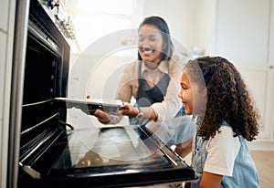 Mother, oven or child baking in kitchen as a happy family with young girl learning cookies recipe. Mixing cake, daughter