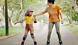 Mother, park and holding hands to rollerskate with girl child with care, learning and support. Interracial parent