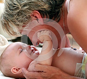 Mother Playing with Baby photo